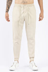 Jogger hombre crema