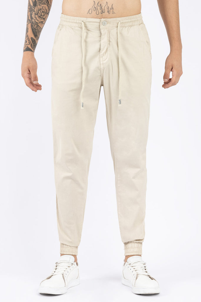 Jogger hombre crema
