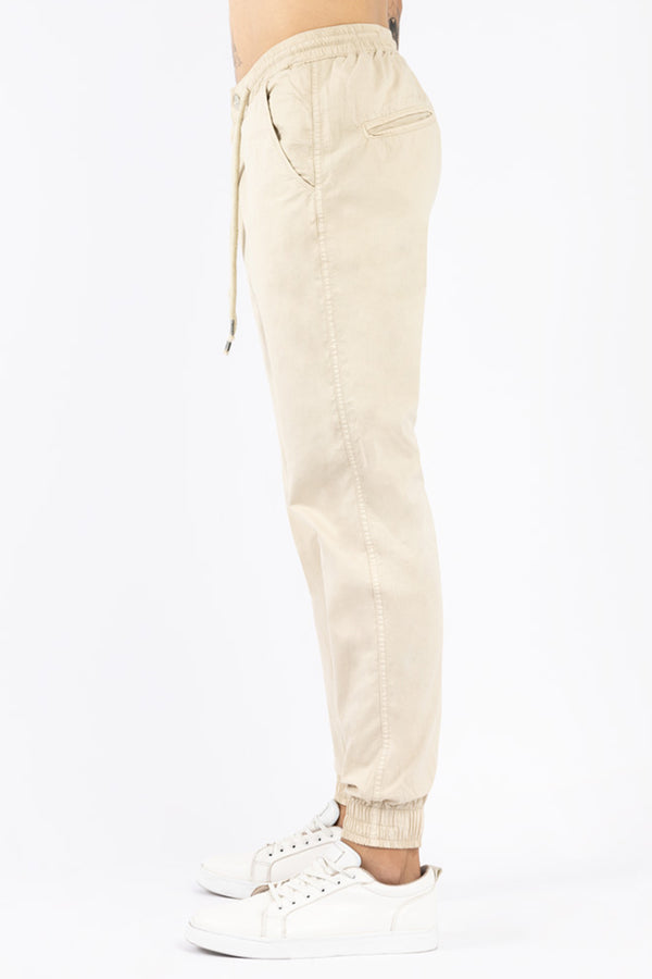 Jogger hombre crema